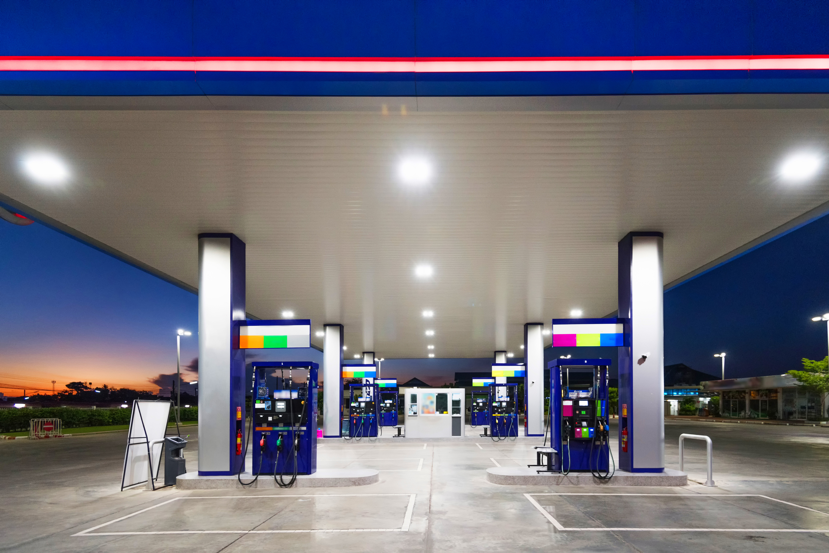 Gas fuel station with sunrise sky